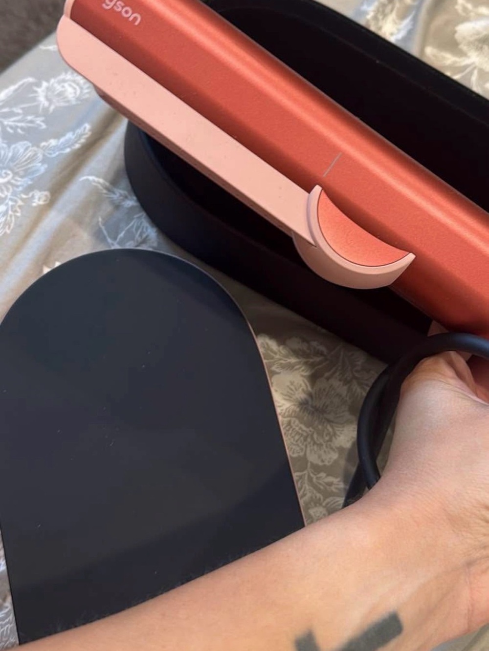 Dyson hair straightener in coral and blush